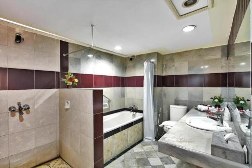 Koupelna v ubytování Sahid Kawanua Hotel