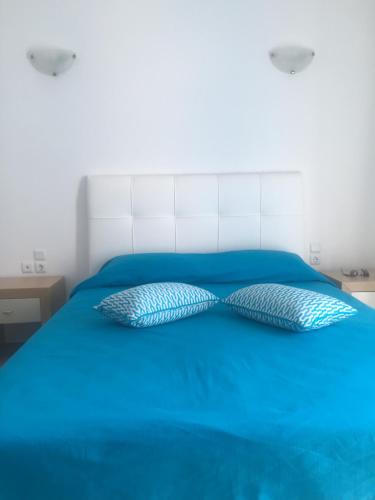 Ein Bett oder Betten in einem Zimmer der Unterkunft Artemis Village