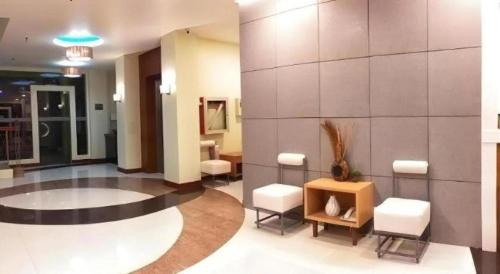 Χώρος καθιστικού στο Hotel Camila 2