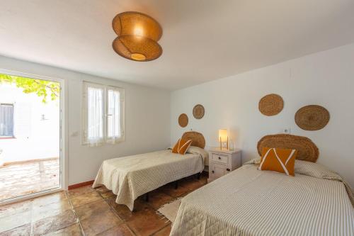 Postel nebo postele na pokoji v ubytování Casa Pájaro del Músico, Bologna