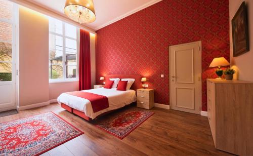 Un pat sau paturi într-o cameră la De Drie Koningen