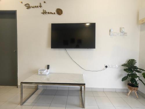 TV a/nebo společenská místnost v ubytování SW Homestay