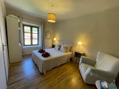 Кровать или кровати в номере Auberge de Corsas