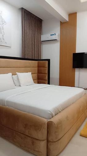 Postel nebo postele na pokoji v ubytování VANELI Apartment