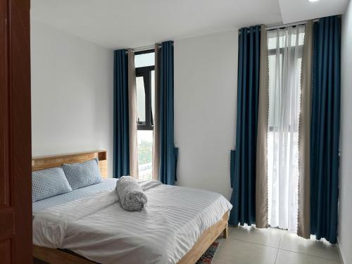 Postel nebo postele na pokoji v ubytování Sophia Apartment S14-08