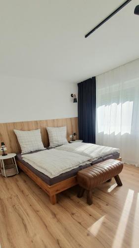 Llit o llits en una habitació de Ferienwohnung AlbMe