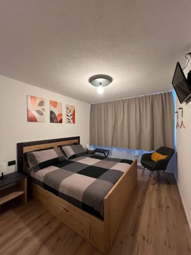 Postel nebo postele na pokoji v ubytování Appartamento Marilleva 1400