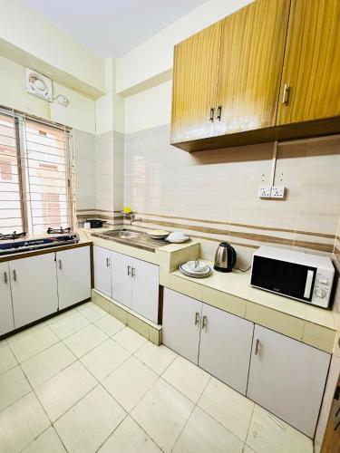 Kuchyň nebo kuchyňský kout v ubytování Samudra Bari