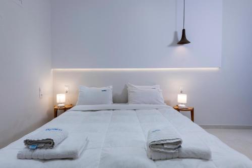 Llit o llits en una habitació de Andromeda Residence
