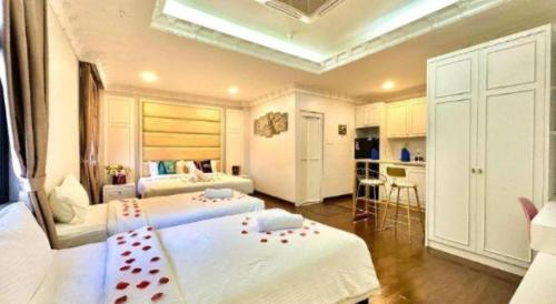 Ένα ή περισσότερα κρεβάτια σε δωμάτιο στο Well Hotel by UHA