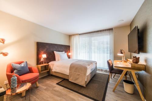 Ένα ή περισσότερα κρεβάτια σε δωμάτιο στο Hotel My Way Zürich Wallisellen