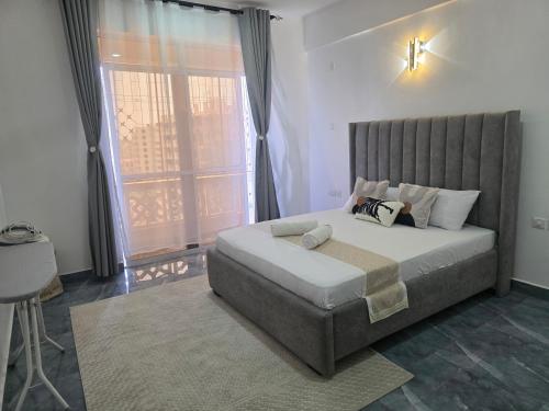 Ένα ή περισσότερα κρεβάτια σε δωμάτιο στο EL Nido