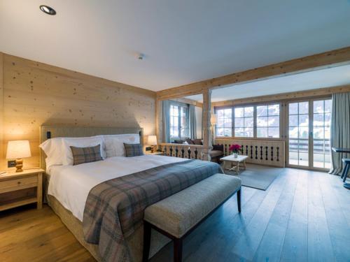 Voodi või voodid majutusasutuse Hotel Le Grand Chalet Gstaad toas