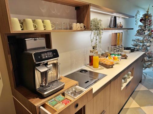 Η κουζίνα ή μικρή κουζίνα στο Motel Reich