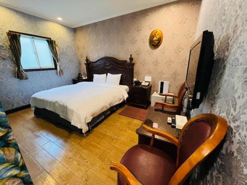 Postel nebo postele na pokoji v ubytování Huis Ten Bosch