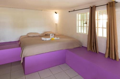 Una cama o camas en una habitación de Seven Elements Appart