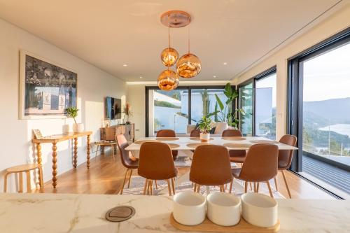 a dining room with a table and chairs at Gerês Paradise in Geres