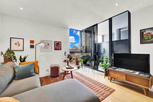 Et tv og/eller underholdning på Stylish Inner City Apartment