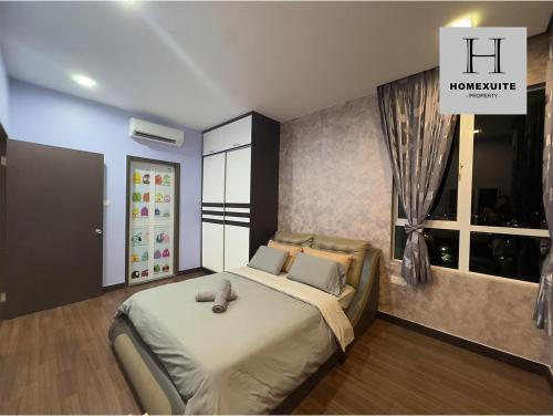 Postel nebo postele na pokoji v ubytování Homexuite Vacation at Utama South 3