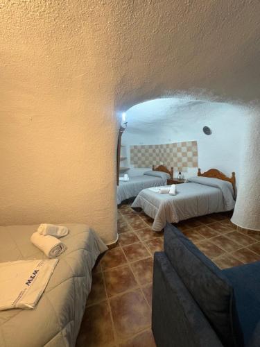 Кровать или кровати в номере Hermosa Vista