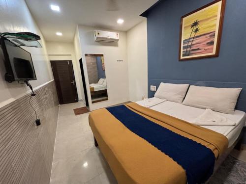 Una cama o camas en una habitación de Hotel Anuha