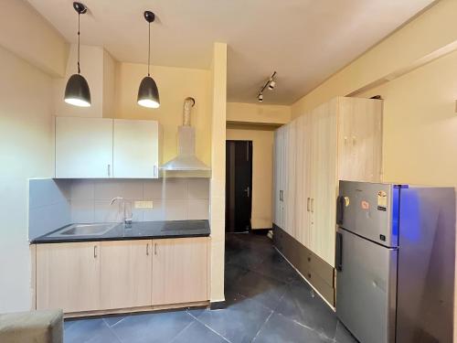 Køkken eller tekøkken på Samriddhi Studio Apartment