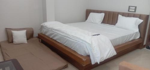 Postel nebo postele na pokoji v ubytování Moon palace