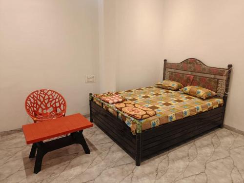 Postel nebo postele na pokoji v ubytování Shri Vyankatesh Bhakt Niwas