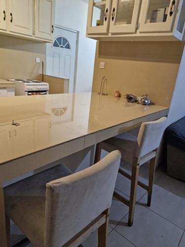 Virtuvė arba virtuvėlė apgyvendinimo įstaigoje St Lucie Suite