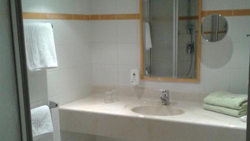 Un baño de Apartment im Wellnesshotel an der Piste, Sauna, Pool, Frühstück All-Inclusive möglich