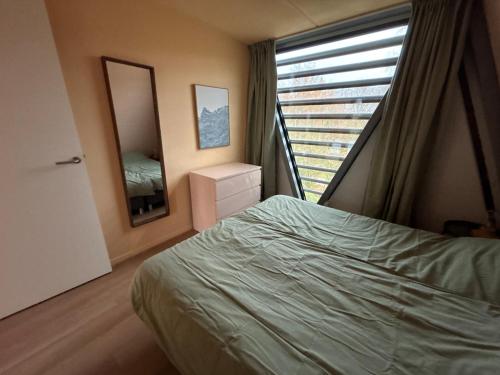 Postel nebo postele na pokoji v ubytování Villa Roos - new cozy location with hottub