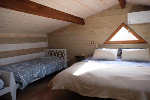 Postel nebo postele na pokoji v ubytování Duplex proche du port