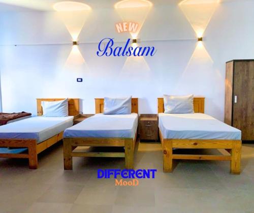 Postel nebo postele na pokoji v ubytování Balsam hotel