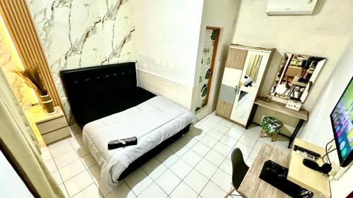 TV/trung tâm giải trí tại Roomate Inn Sky Garden