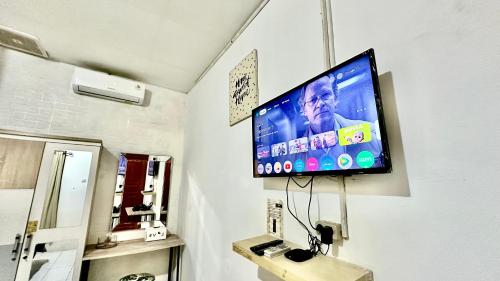 TV/trung tâm giải trí tại Roomate Inn Sky Garden