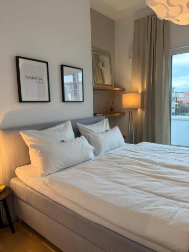 Giường trong phòng chung tại Deluxe Penthouse Goldsteinkoje 1