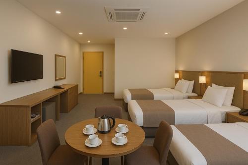 TV a/nebo společenská místnost v ubytování Khatai Aura Hotel