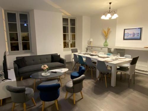 Posezení v ubytování Plein centre, parking jardin 4 chambres