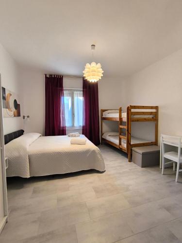 Postel nebo postele na pokoji v ubytování B&B La Coccinella