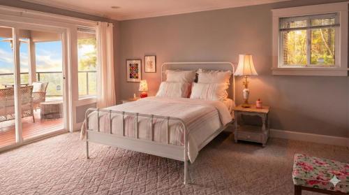 Postel nebo postele na pokoji v ubytování Baylight-天使谷