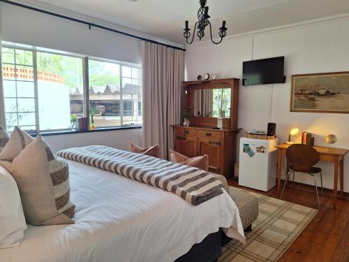 Postel nebo postele na pokoji v ubytování 3@Marion Guest House