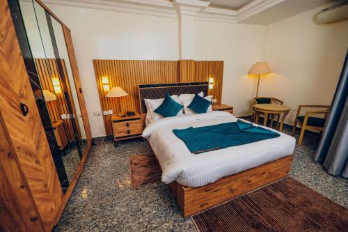 Postel nebo postele na pokoji v ubytování Rakka Hotel by Cocobean