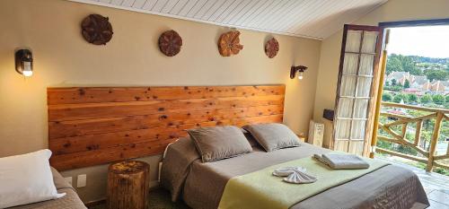 Giường trong phòng chung tại Pousada Atalaia