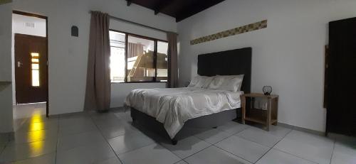 Кровать или кровати в номере HAPPY PLACE @ 3