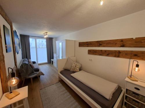 Un pat sau paturi într-o cameră la Come In