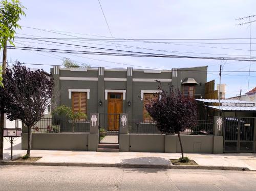a house on the side of a street at Complejo Varge Norte in Alta Gracia