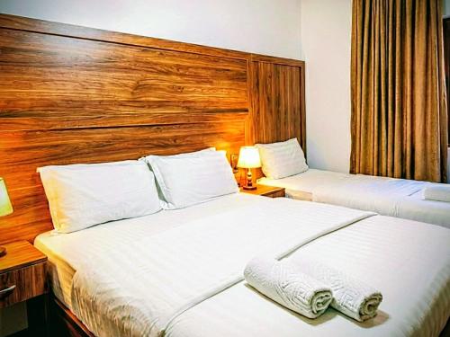 Postel nebo postele na pokoji v ubytování City Urban Hotel