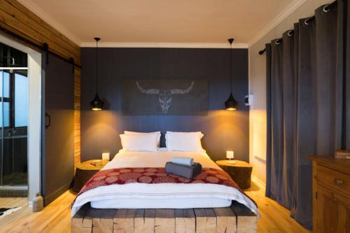 Кровать или кровати в номере The Cabins Hogsback