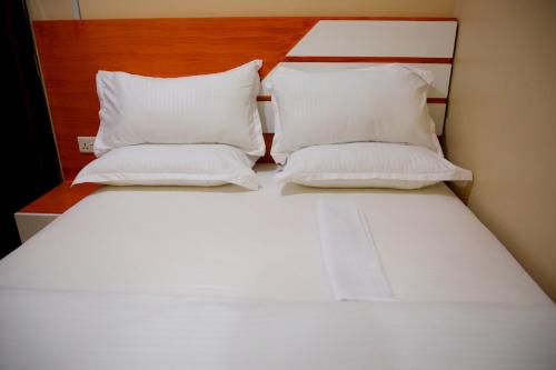 Ένα ή περισσότερα κρεβάτια σε δωμάτιο στο The Min Capri Haven Studio