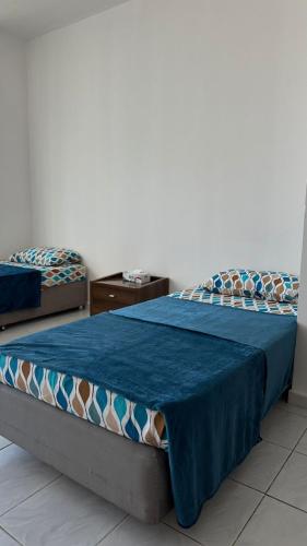 Single bed in al Majaz 2 - سوبر ديلوكس سرير مفرد في شقة فندقية